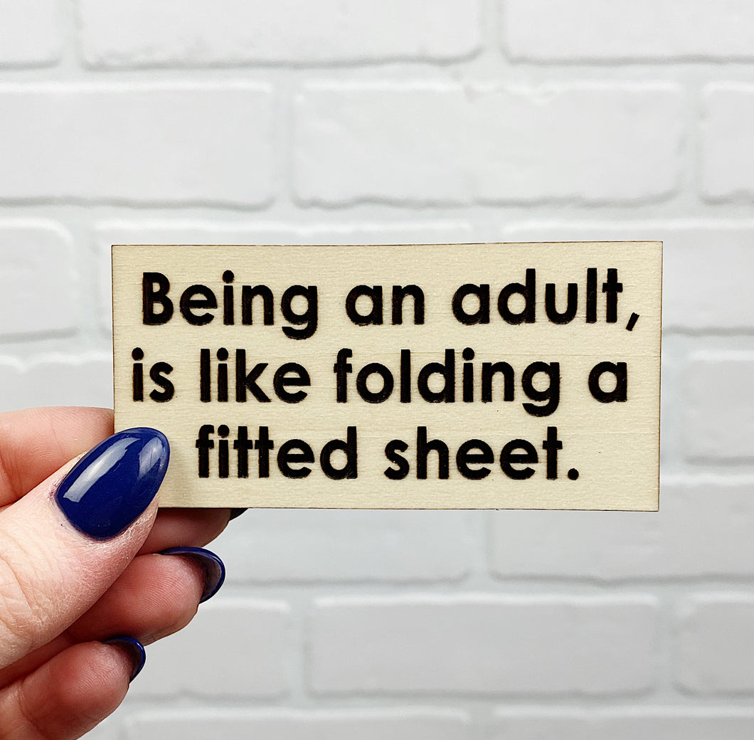 Being An Adult Is Like Folding A Fitted Sheet | Wooden Magnet | Magnet