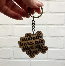Load image into Gallery viewer, Nobody Loves Me Like My Dog(s) | Wooden Keychain
